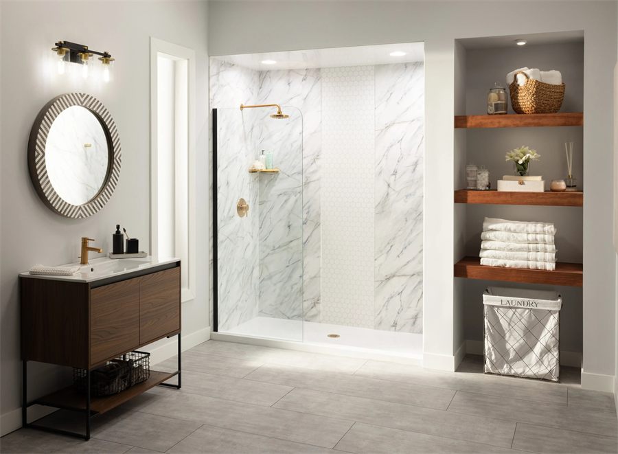Walk-in shower with marble-look walls, hexagonal tile inset and brushed gold fixtures