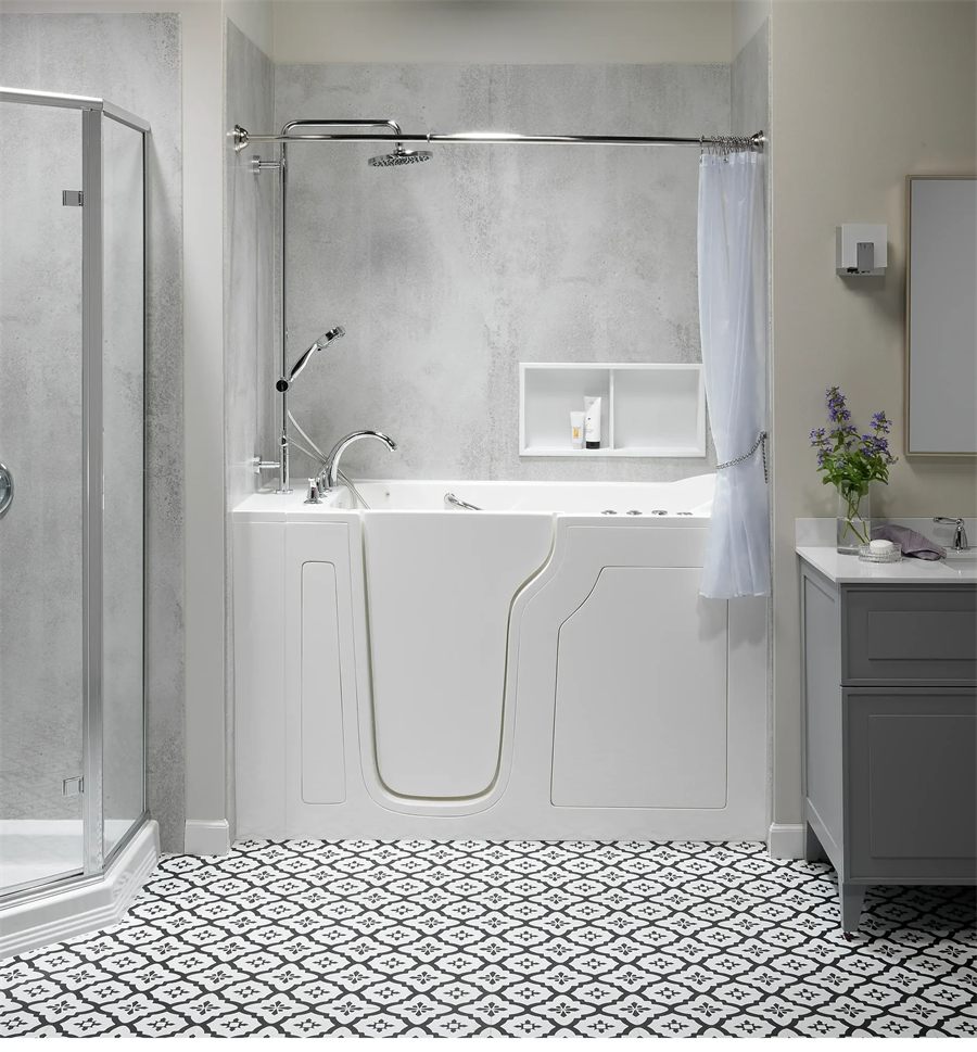 Walk-in bathtub with a sealed door and low step, set over patterned floor tile